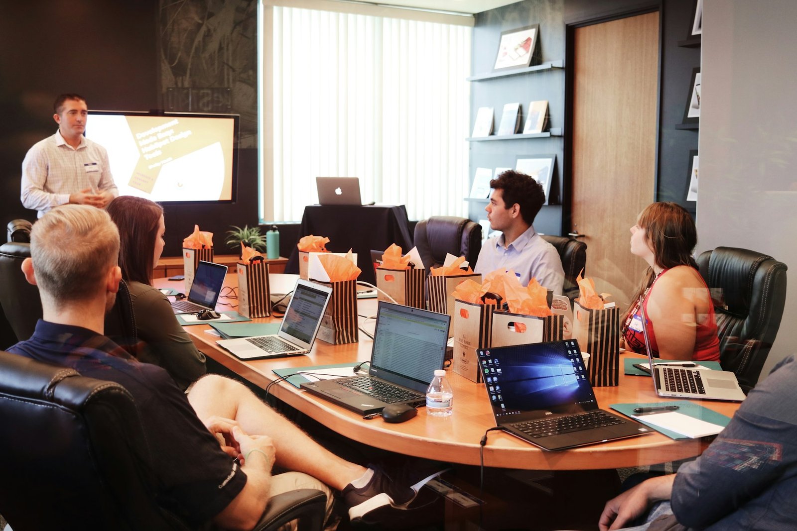 Professional presenting to a law firm team